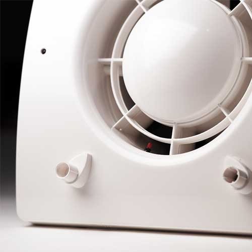 Elta FLUX DMEV 100 ventilation fan with constant running trickle and boost modes, mounted on a ceiling for efficient airflow.