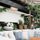 Systemair Frico IHC12 infrared radiant heater emitting warm light, designed for outdoor patios and heating spaces efficiently.