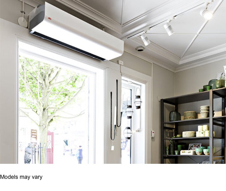 Systemair Frico PA1508E03 air curtain for small openings, electric model, installed in a commercial or retail space.